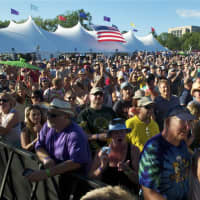 <p>A massive crowd watches the main stage Friday at Gathering of the Vibes.</p>
