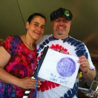 <p>Audrey and Christopher Hebert, volunteers at the Gathering of the Vibes.</p>