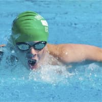 <p>Liam McGrinder of Pleasantville competes in the butterfly.</p>