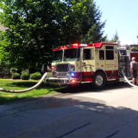 <p>A Mount Kisco firetruck is hooked up to a hydrant in Riverwoods.</p>