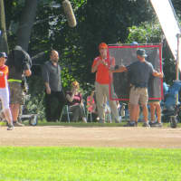 <p>Movie and television actor Paul Giamatti, center, on the set of a Showtime television pilot titled &quot;Billions,&#x27;&#x27; which filmed parts of &quot;episode three&quot; on the Rye High School baseball field on Tuesday. </p>