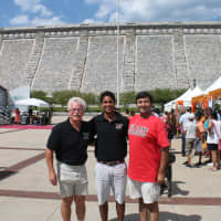 <p>Mike Chiapparelli, coach of the Mamaroneck High School baseball team, left, with Kumar Nambiar and Sid Mehta at Sunday&#x27;s Heritage of India Festival where Nambiar was honored.</p>