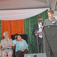 <p>Kumar Nambiar at the podium on Sunday reading the inscription on his award and then  award and then thanking various people.
</p>