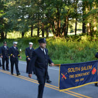 <p>South Salem firefighters march in their parade.</p>