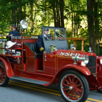 <p>A vintage South Salem firetruck is driven in the local parade.</p>