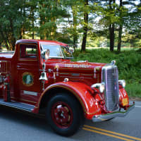 <p>A vintage Croton Falls firetruck is driven in the South Salem parade.</p>