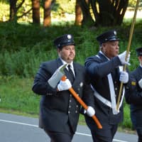 <p>Bedford Hills firefighters march in the South Salem parade.</p>
