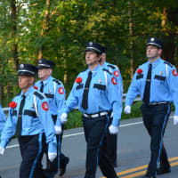 <p>Mill Plain (Danbury) firefighters march in the South Salem parade.</p>