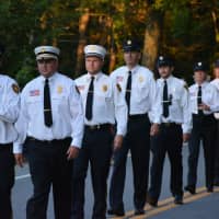 <p>Rowayton firefighters march in the South Salem parade.</p>