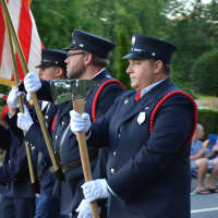 <p>Noroton (Darien) firefighters march in the South Salem parade.</p>