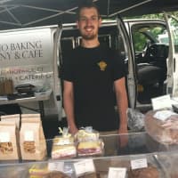 <p>Tyler Holder, manager at SONO Baking Company &amp; Cafe at Old Greenwich Farmers Market.</p>