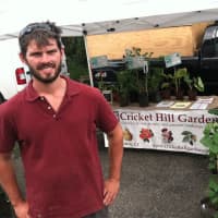 <p>Dan Furman, co-owner of Cricket Hill Garden, of Thomaston, at the Old Greenwich Farmers Market.</p>