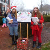 <p>Somers High School ninth graders Cassie Panzarino and Lauren Felis collected warm clothing as a volunteer activity with their Girl Scout Troop.</p>