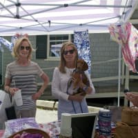<p>Deborah Connelly (left) and Sydney Bellinger, with Daisy Mae, all of Rye, N.Y., shop at the Rowayton Farmers Market.</p>
