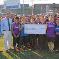 <p>The check presentation to the Bridgeport Caribe Youth Leaders.</p>