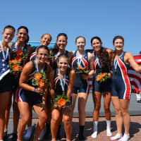 <p>Darien&#x27;s Julia Cornacchia, standing second from left, celebrates with teammates after winning a bronze medal at the World Junior Championships. Cornacchia rows for the Connecticut Boat Club of Norwalk.</p>