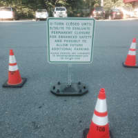 <p>Signage and cones posted to block off the median gap along Katonah Avenue.</p>