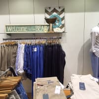 <p>The shelves at the Darien Sport Shop are stocked with back-to-school clothing.</p>