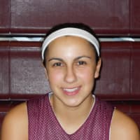 <p>Senior Ali Menniti and her Harrison teammates will be playing up-tempo basketball this season as the Huskies welcome seven new players.</p>