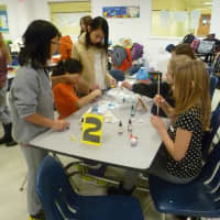 <p>Yorktown middle school students make a product during Tuesday&#x27;s IBM workshop.</p>