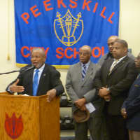 <p>Mel Buress and the African American Men of Westchester presented the school with a $500 donation towards the new fitness center.</p>
