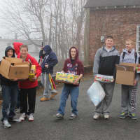 <p>Members of Let&#x27;s Play It Forward in Somers delivered more than 1,000 baby and pet items and other goods for Hurricane Sandy relief on Staten Island.</p>