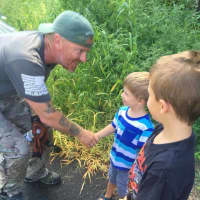 <p>Neil Davis meets some young supporters as he makes his way to Danbury on his coast-to-coast trek to spotlight the needs of veterans. </p>