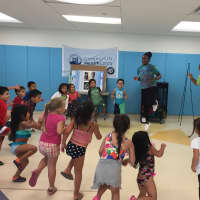 <p>Current CT HealthCorps members play Simon Says with Head Start students to have fun while doing physical activities.
</p>