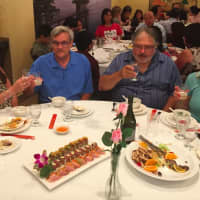 <p>Diners, from left, Julia Rachinsky-Wood, Kevin Wood, property owner Alex Totino and Kathy Totino at the Pearl East restaurant&#x27;s grand opening Thursday. </p>