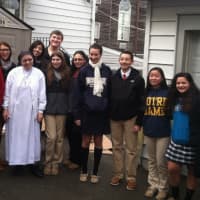<p>Notre Dame-Fairfield&#x27;s Key Club members and advisers brought donations to Sister Theresa Tremblay. (See story for identifications.) </p>