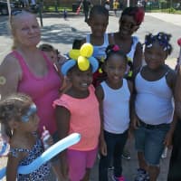 <p>Kids enjoy face painting, basketball and other games at Saturday&#x27;s event. </p>