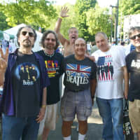 <p>A group of Beatles fans gets photobombed by another fan at Saturday&#x27;s Fab 4 Music Festival at the Ives Center in Danbury.</p>