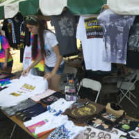 <p>T-shirts and other souvenirs fill the festival. </p>