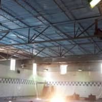 <p>The drop ceiling has been removed at the YMCA pool in New Rochelle.</p>