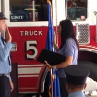 <p>New Wilton Firefighter Don Scarpetti gets sworn in in front of Truck 5.</p>