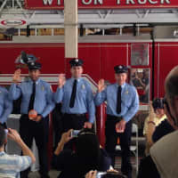 <p>The four newest members of the Wilton Fire Department with their probationary shields.</p>