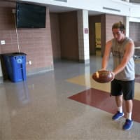 <p>Tuskers kicker/punter Eric Sylvester (ranked No. 1 in the state) practices indoors Monday, as kicking coach Fred Krell watches.</p>