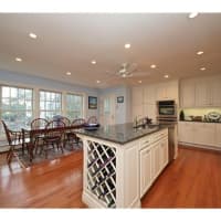 <p>The home features a kitchen with updated appliances.</p>