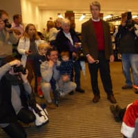 <p>Santa Claus was quite the attraction in Wilton on Friday as part of the Wilton Holiday Stroll, which was brought inside the Wilton Library because of rain. </p>