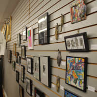 <p>The tour also stopped at Scott Camera at 12 S. Division St. where several pieces are on display.</p>