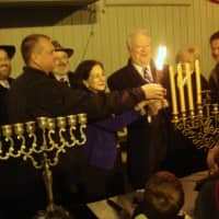 <p>Norwalk officials light the menorah for the third night of Hanukkah in the annual ceremony at Stew Leonard&#x27;s.</p>
