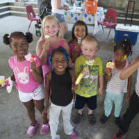 <p>Kids at Washington Village enjoy free ice cream at Friday&#x27;s Family Day.</p>