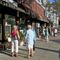 <p>People walk the streets of Ridgefield looking at art from local artists. </p>