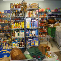<p>This is a room at the New Canaan Food Pantry, located in the basement of St. Mark&#x27;s Episcopal Church in New Canaan. While the pantry is well stocked for the holiday season, co-director Carol Harvey hopes people will keep giving after the holidays.</p>