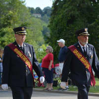 <p>Grand marshals march in the Carmel Fire Department&#x27;s 100th anniversary parade.</p>