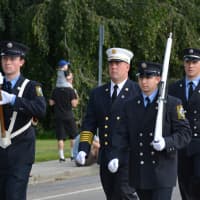<p>Kent firefighters march in the Carmel Fire Department&#x27;s 100th anniversary parade.</p>