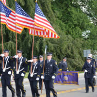 <p>Lake Carmel firefighters march in the Carmel Fire Department&#x27;s 100th anniversary parade.</p>
