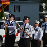 <p>Croton Falls firefighters march in the Carmel Fire Department&#x27;s 100th anniversary parade.</p>