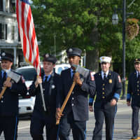 <p>Putnam Lake firefighters march in the Carmel Fire Department&#x27;s 100th anniversary parade.</p>