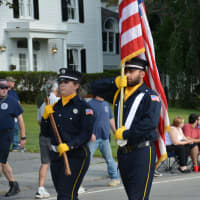 <p>Somers firefighters march in the Carmel Fire Department&#x27;s 100th anniversary parade.</p>